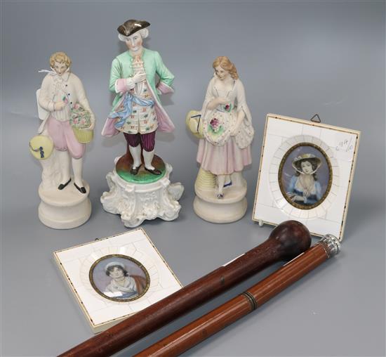 A gilt metal coronet, framed crystoleum, pair of ivory framed miniatures and two walking canes